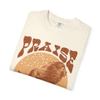 Faithful Citizens Apparel Co Men's T-shirt featuring a bold “Praise the King” lettering and a lion illustration Psalm 47:7 Ivory