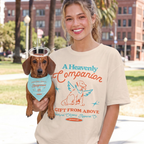 Faithful Citizens Apparel Co Women's T-shirt A heavenly companion Human and Dog shirt Dog with wings illustration James 1:17 Ivory