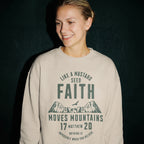 Faithful Citizens Apparel Co Women's Sweatshirt with a mountain graphic and “Faith moves mountains” lettering Matthew 17:20 Sand