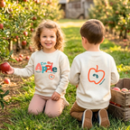 Faithful Citizens Apparel Co Unisex Kids Toddler Sweatshirt "I'm the apple of his eye" Apple illustration Psalm 17:8 Natural Heather