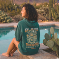 Faithful Citizens Apparel Co Woman's Hoodie with a snake graphic and “Bless your enemies extend grace” lettering Romans 12:14 Blue Spruce